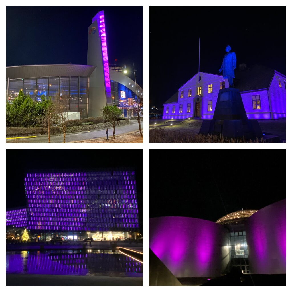 Smáralind, stjórnarráðshúsið, Harpa og Perlan í fjólubláu ljósi.