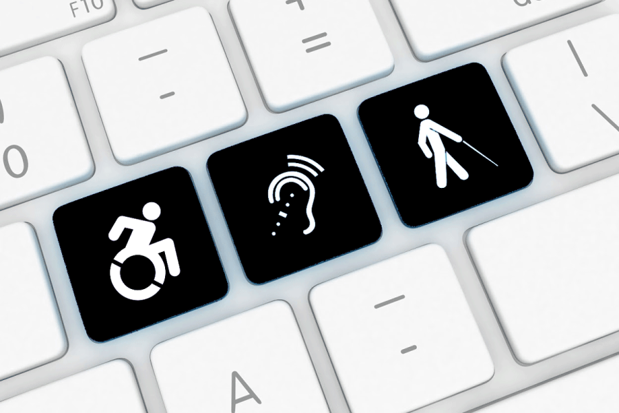Mynd af lyklaborði þar sem eru þrír hnappar með táknum aðgengis: þ.e. fólk sem er 1) hreyfihamlað 2) með heyrnaskerðingu 3) fólks sem er blint eða með sjónskerðingu